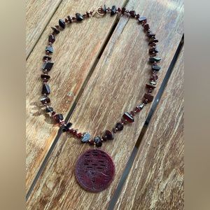 Maroon necklace with real stones and Asian pendant